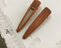Various geometric hollow hair clips made of wood